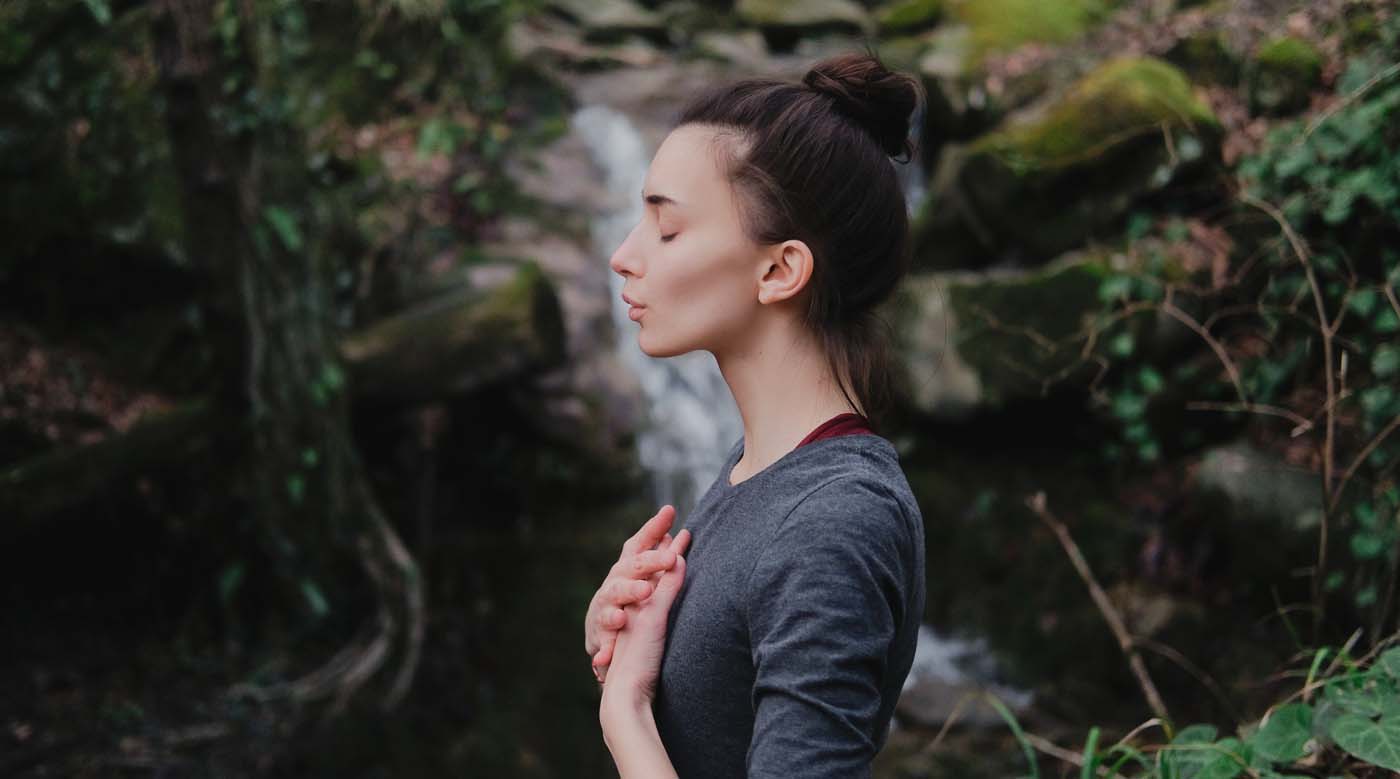 Breathing_exercises_female_by_waterfall