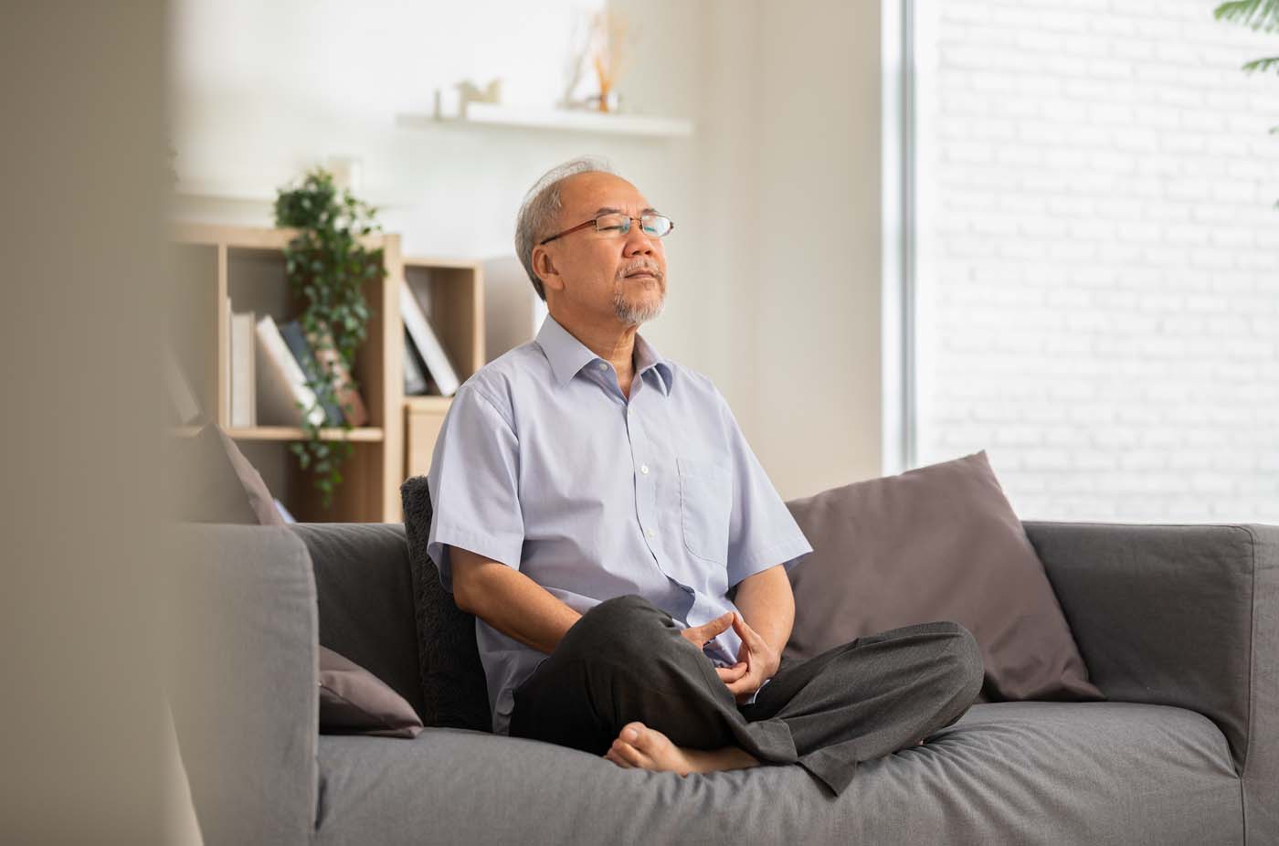 Meditation_male_on_sofa